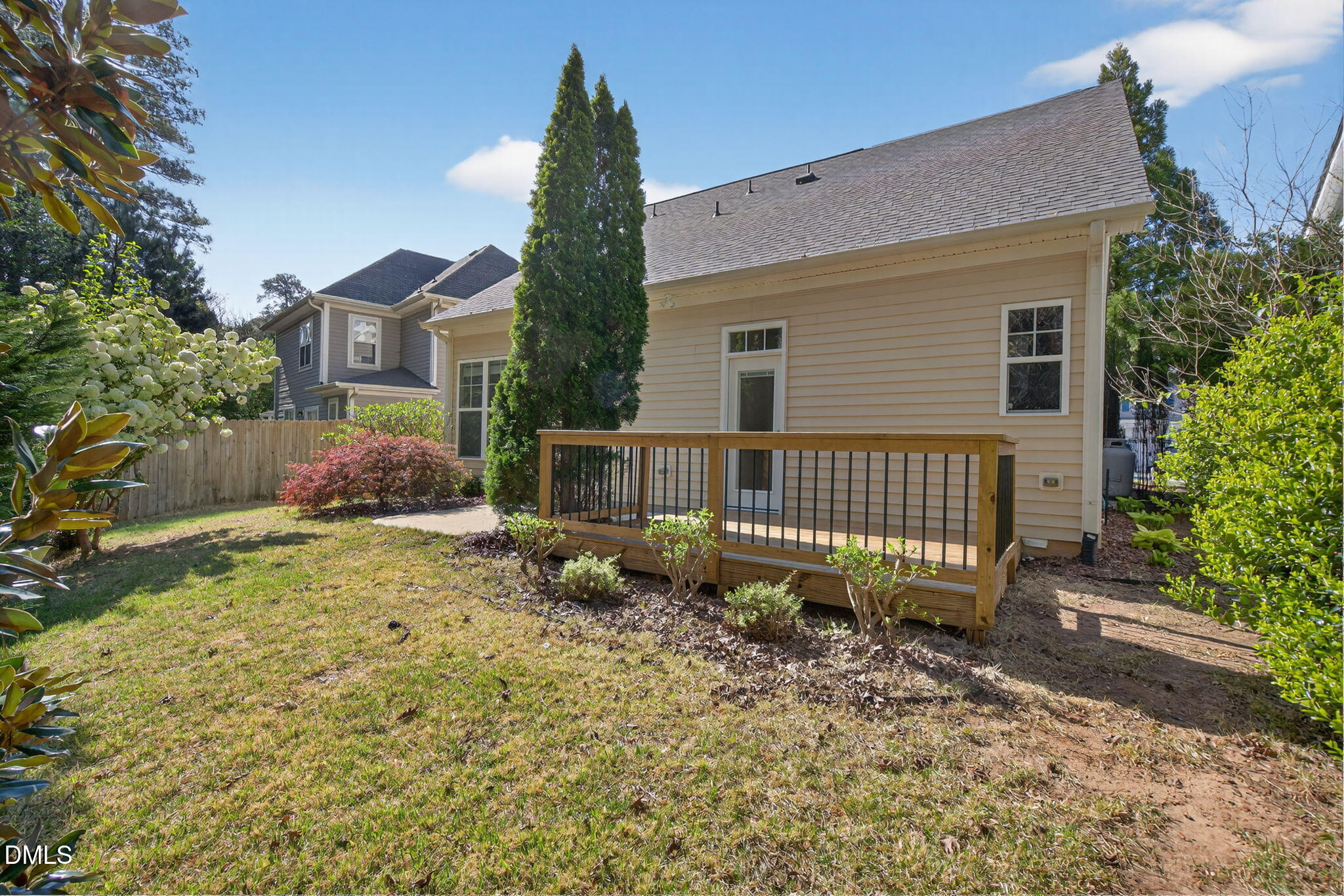 3834 Cumberland Pond Road Raleigh, NC 27606 - Photo 26 of 31 a front view of a house with garden