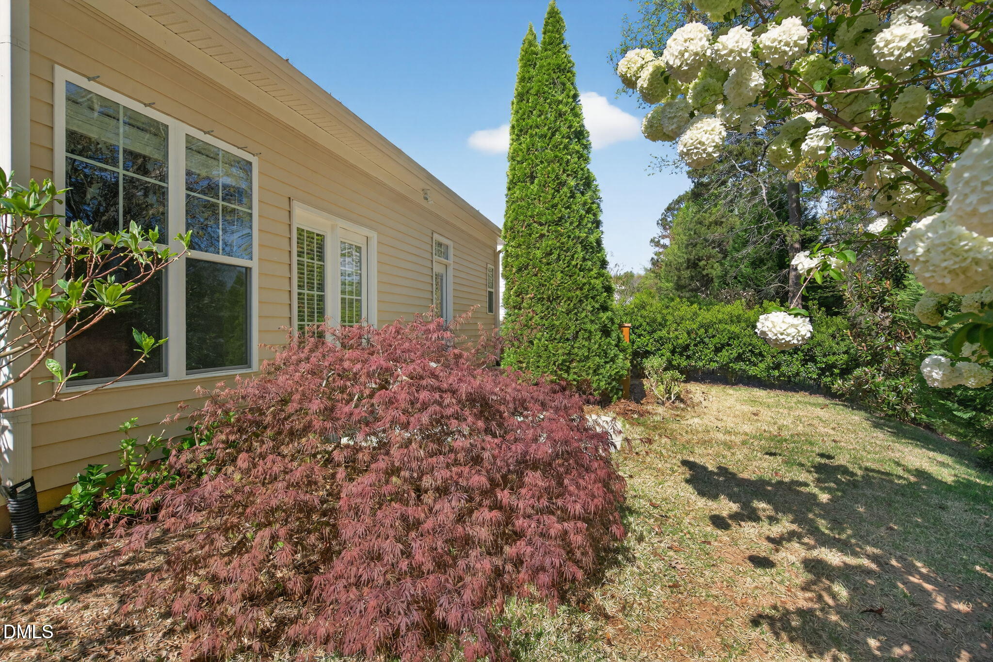 3834 Cumberland Pond Road Raleigh, NC 27606 - Photo 28 of 31 a front view of a house with garden