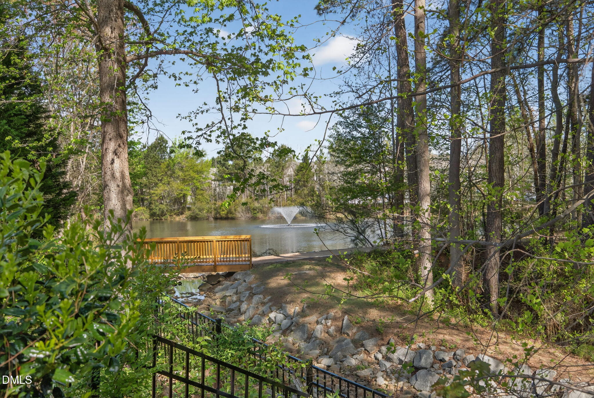 3834 Cumberland Pond Road Raleigh, NC 27606 - Photo 29 of 31 a view of a lake with a yard