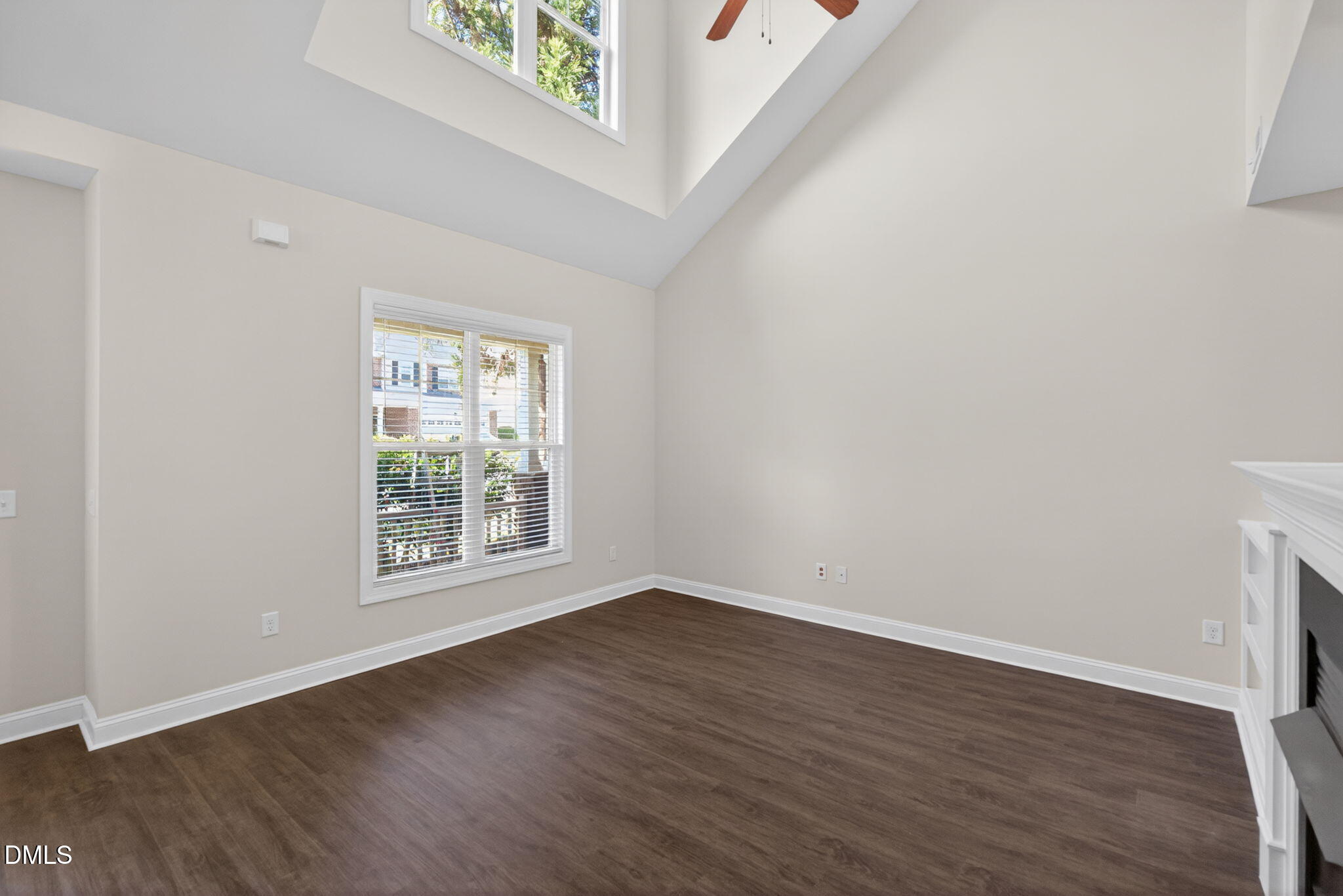 3834 Cumberland Pond Road Raleigh, NC 27606 - Photo 4 of 31 an empty room with wooden floor and windows