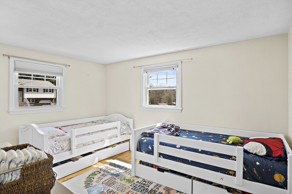 29 Dix Rd Extension Woburn, MA 01801 - Photo 19 of 40 a bedroom with a bed and a window