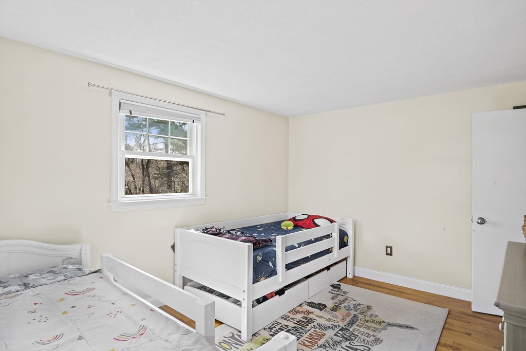 29 Dix Rd Extension Woburn, MA 01801 - Photo 20 of 40 a room with a bed and a window