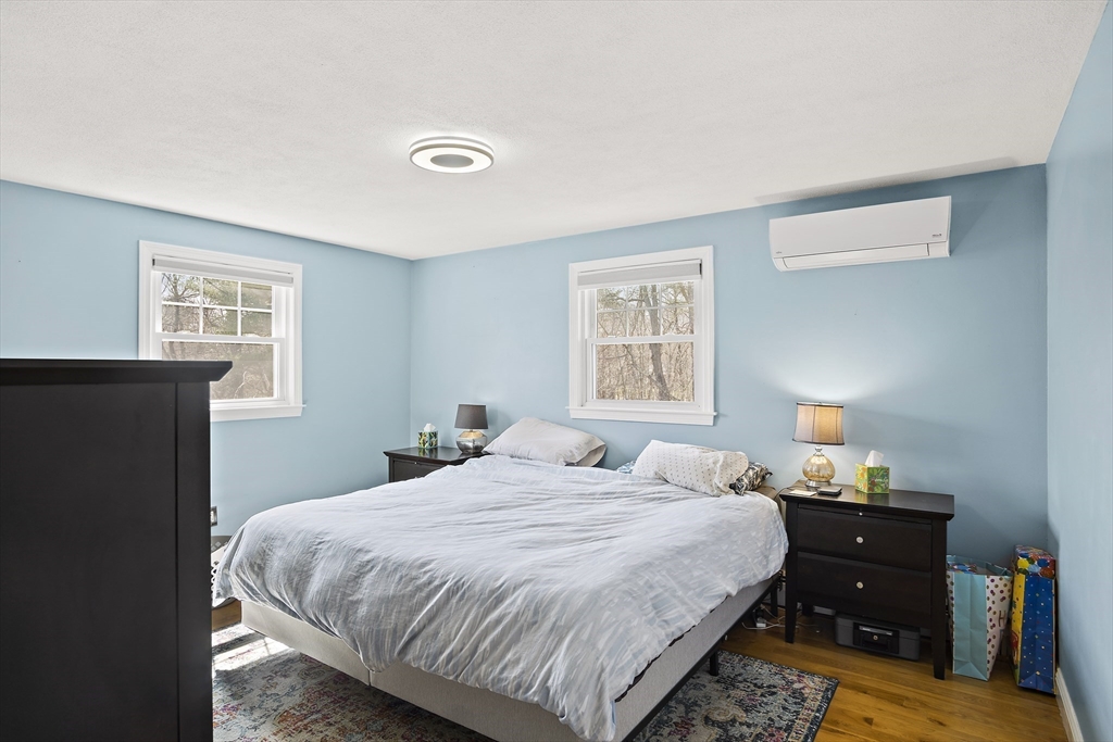 29 Dix Rd Extension Woburn, MA 01801 - Photo 21 of 40 a bedroom with a bed and a window