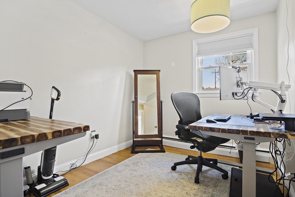 29 Dix Rd Extension Woburn, MA 01801 - Photo 26 of 40 a view of a workspace with furniture