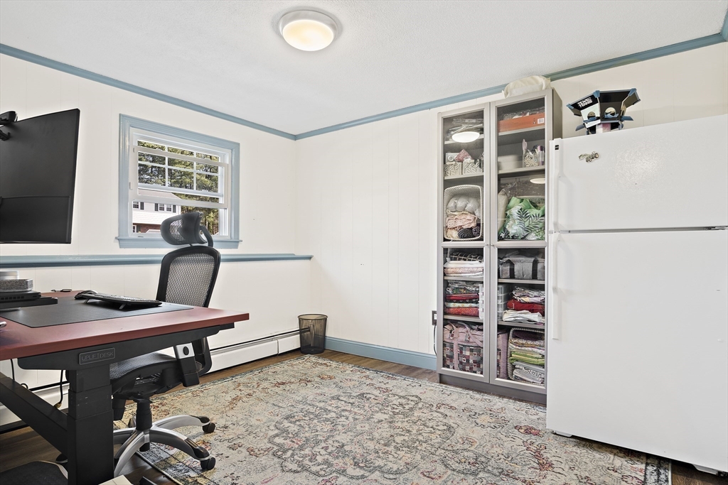 29 Dix Rd Extension Woburn, MA 01801 - Photo 29 of 40 a view of a workspace with furniture and toys