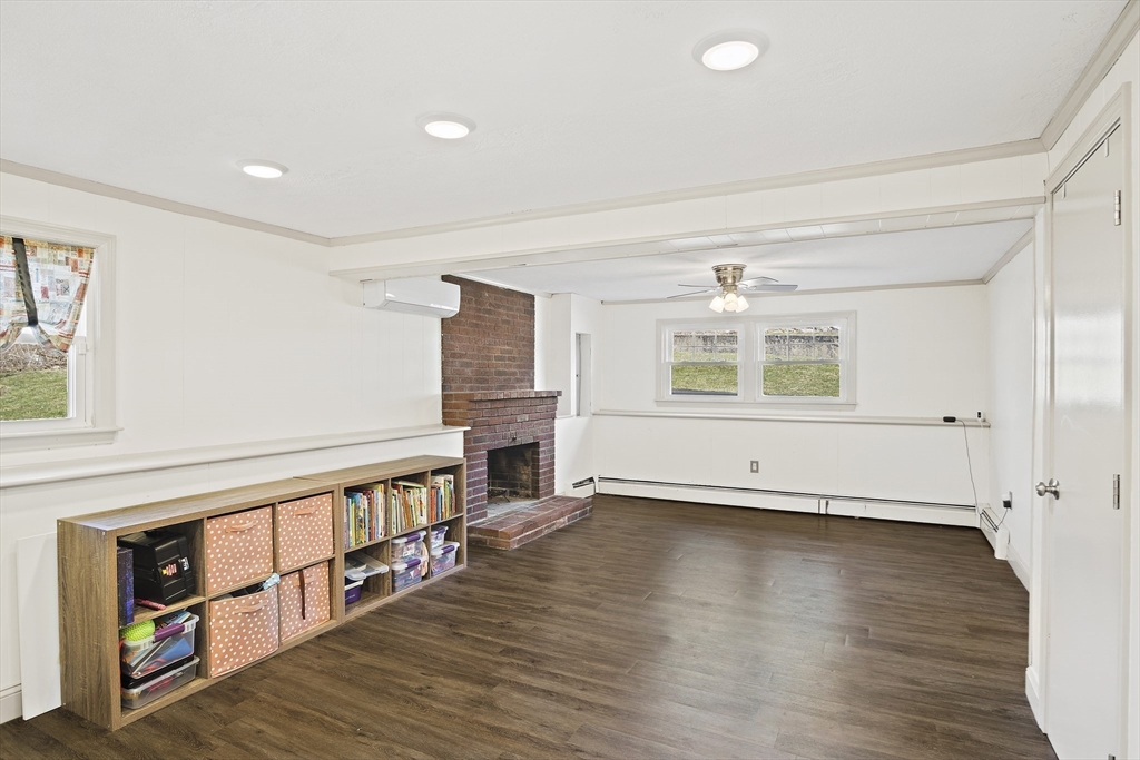 29 Dix Rd Extension Woburn, MA 01801 - Photo 32 of 40 wooden floor in an empty room with a window