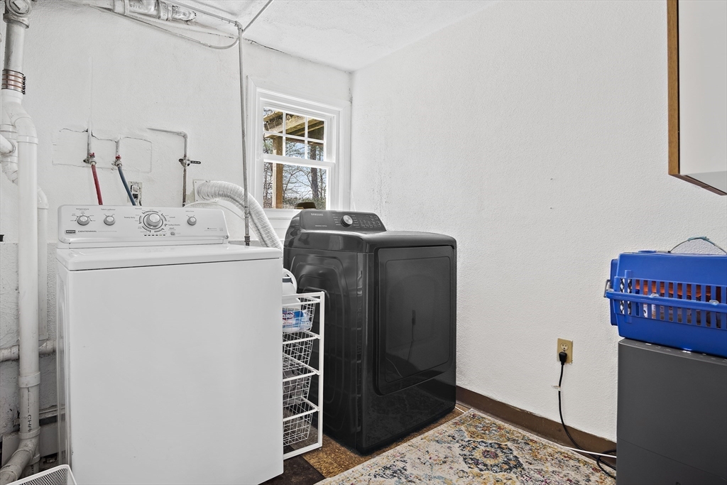 29 Dix Rd Extension Woburn, MA 01801 - Photo 34 of 40 a utility room with dryer and washer