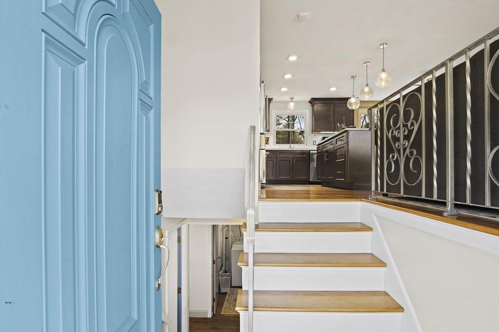 29 Dix Rd Extension Woburn, MA 01801 - Photo 5 of 40 a view of entryway and hall with wooden floor