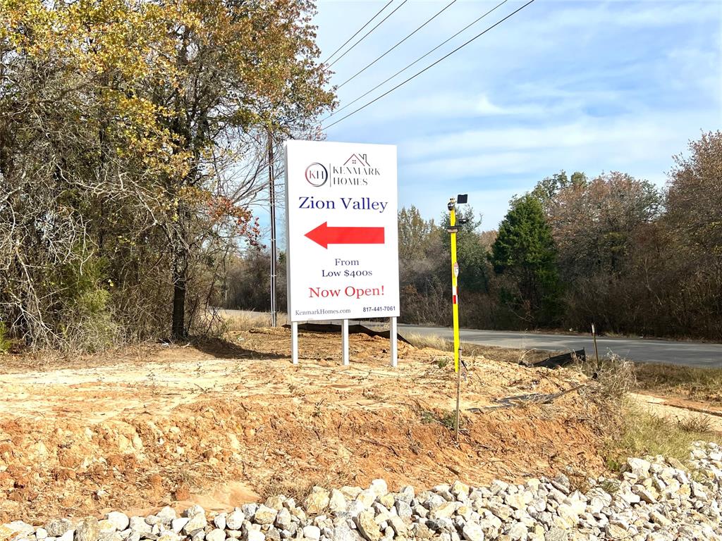 304 Zion Ridge Ridge Poolville, TX 76487 - Photo 3 of 6 a sign board with parking space