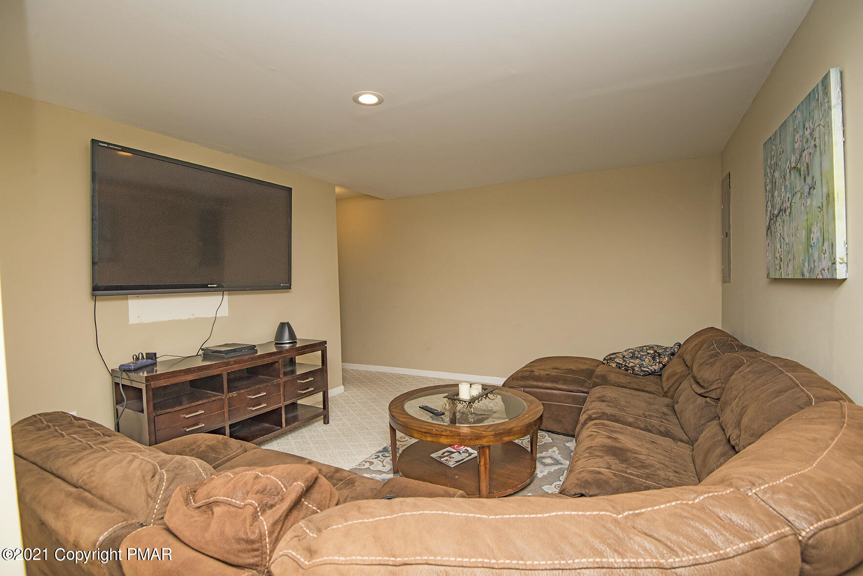 419 Canterbury Road Bushkill, PA 18324 - Photo 36 of 50 a bedroom with furniture and a flat screen tv