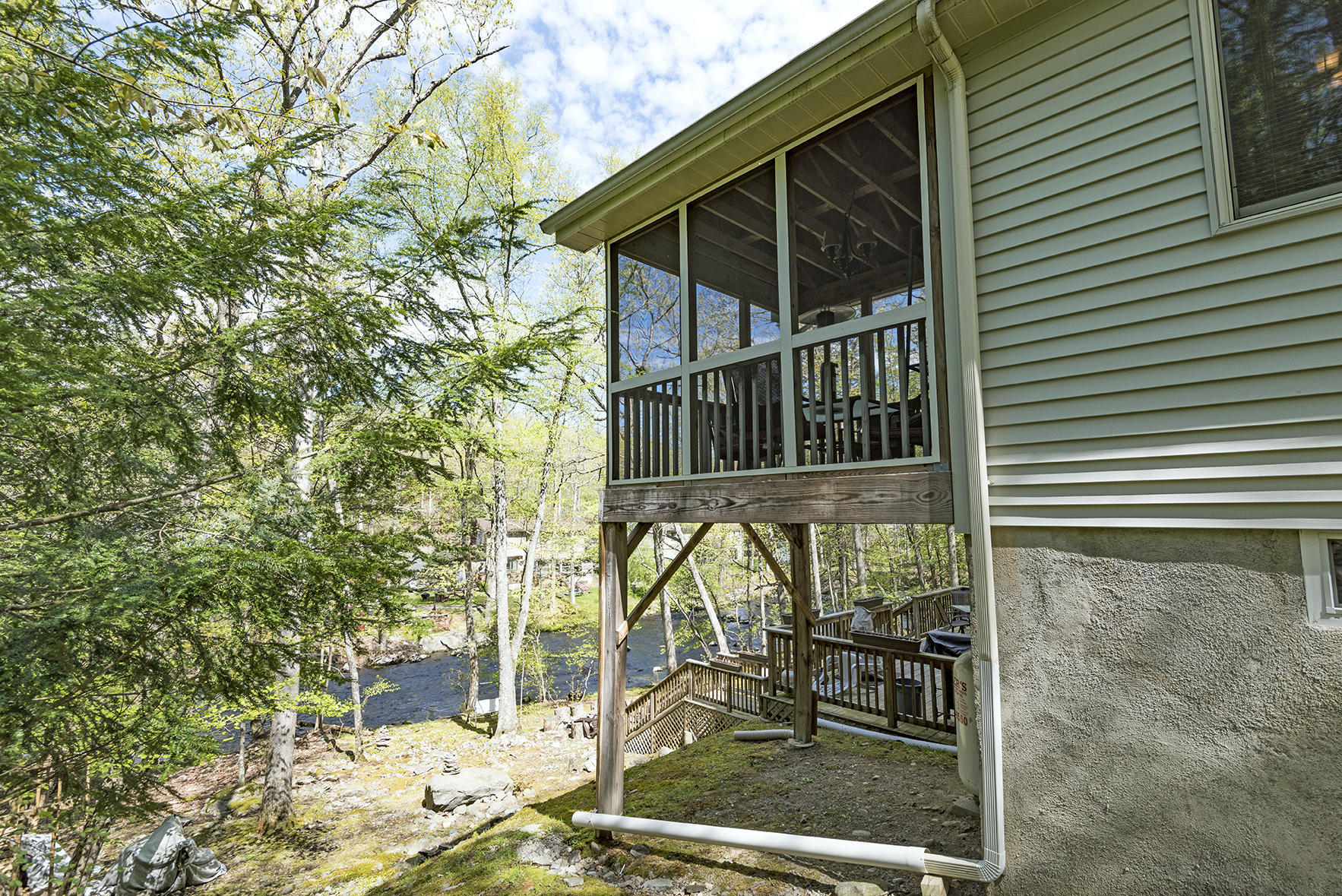 419 Canterbury Road Bushkill, PA 18324 - Photo 4 of 50 a view of house with a yard