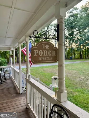 a view of a street with sitting area