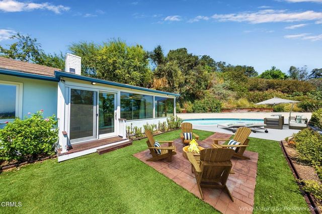 a bathroom with a granite countertop sink mirror and double