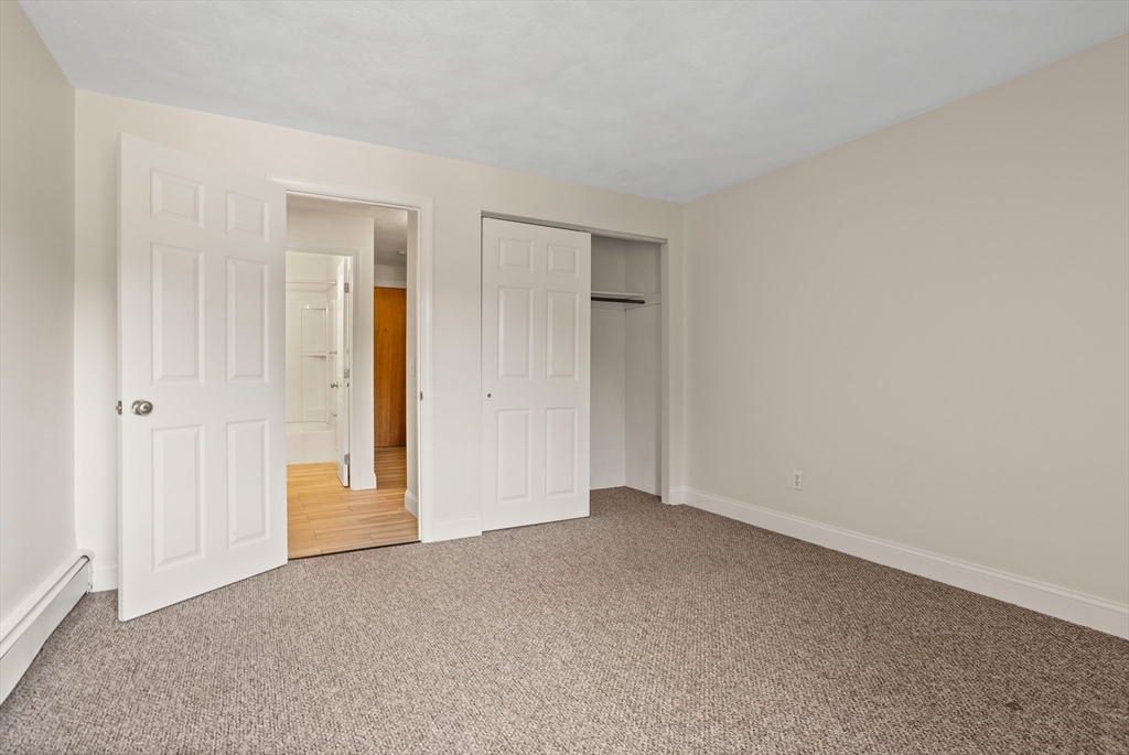 17 Davis Road, Unit C9 Acton, MA 01720 - Photo 2 of 26 a view of an empty room and closet area