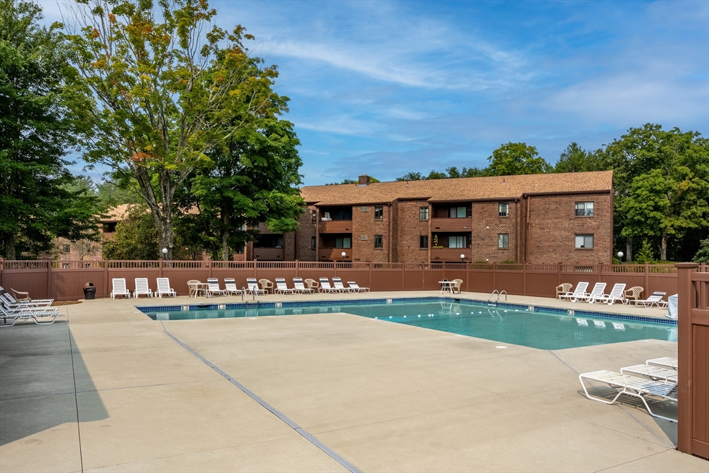 17 Davis Road, Unit C9 Acton, MA 01720 - Photo 23 of 26 front view of a house with a patio