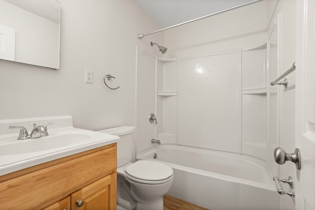 17 Davis Road, Unit C9 Acton, MA 01720 - Photo 7 of 26 a bathroom with a sink a toilet and shower