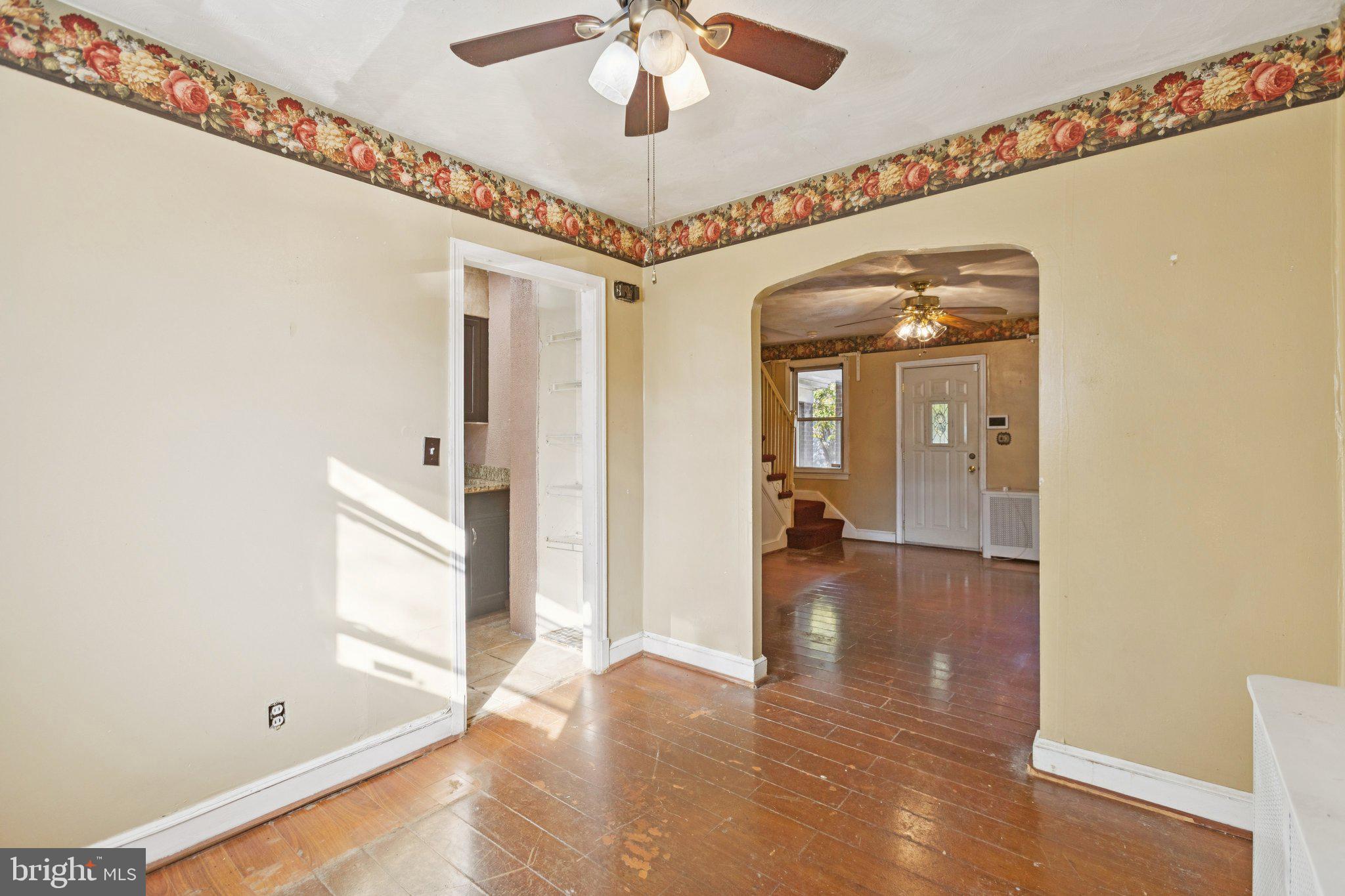 1633 R Street Southeast Washington, DC 20020 - Photo 25 of 44 a view of a hallway with wooden floor and a living room