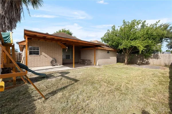 a house with trees in the background