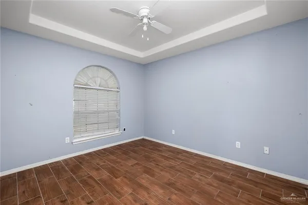 an empty room with a bathroom