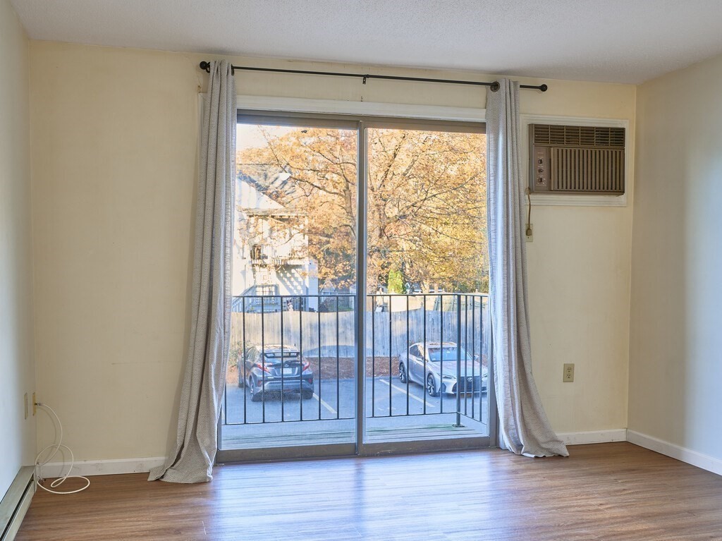 80 Stanton Street, Unit 14 Worcester, MA 01605 - Photo 11 of 26 a view of entryway with wooden floor