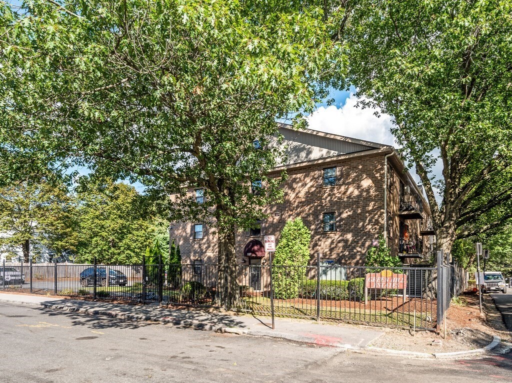 80 Stanton Street, Unit 14 Worcester, MA 01605 - Photo 26 of 26 a street view with large trees