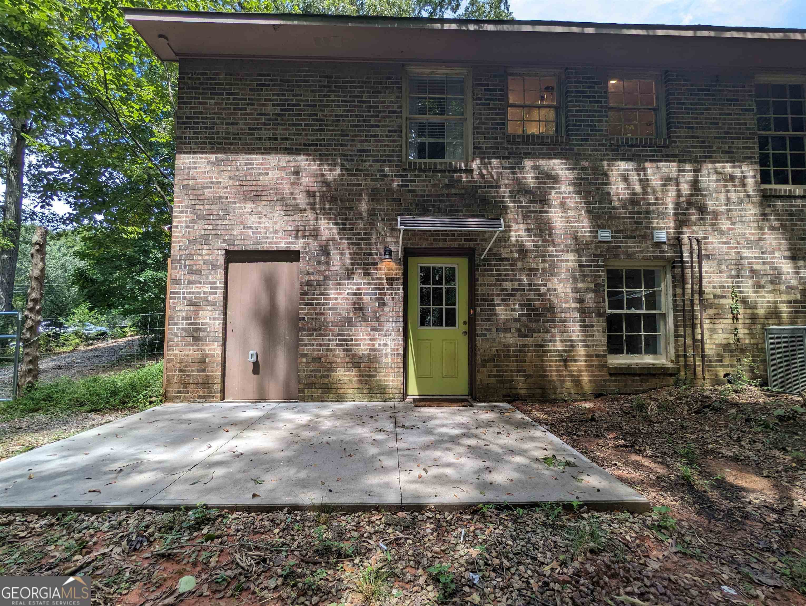 2205 Tallassee Road, Unit 2 Athens, GA 30607 - Photo 1 of 1 a front view of a house with a yard