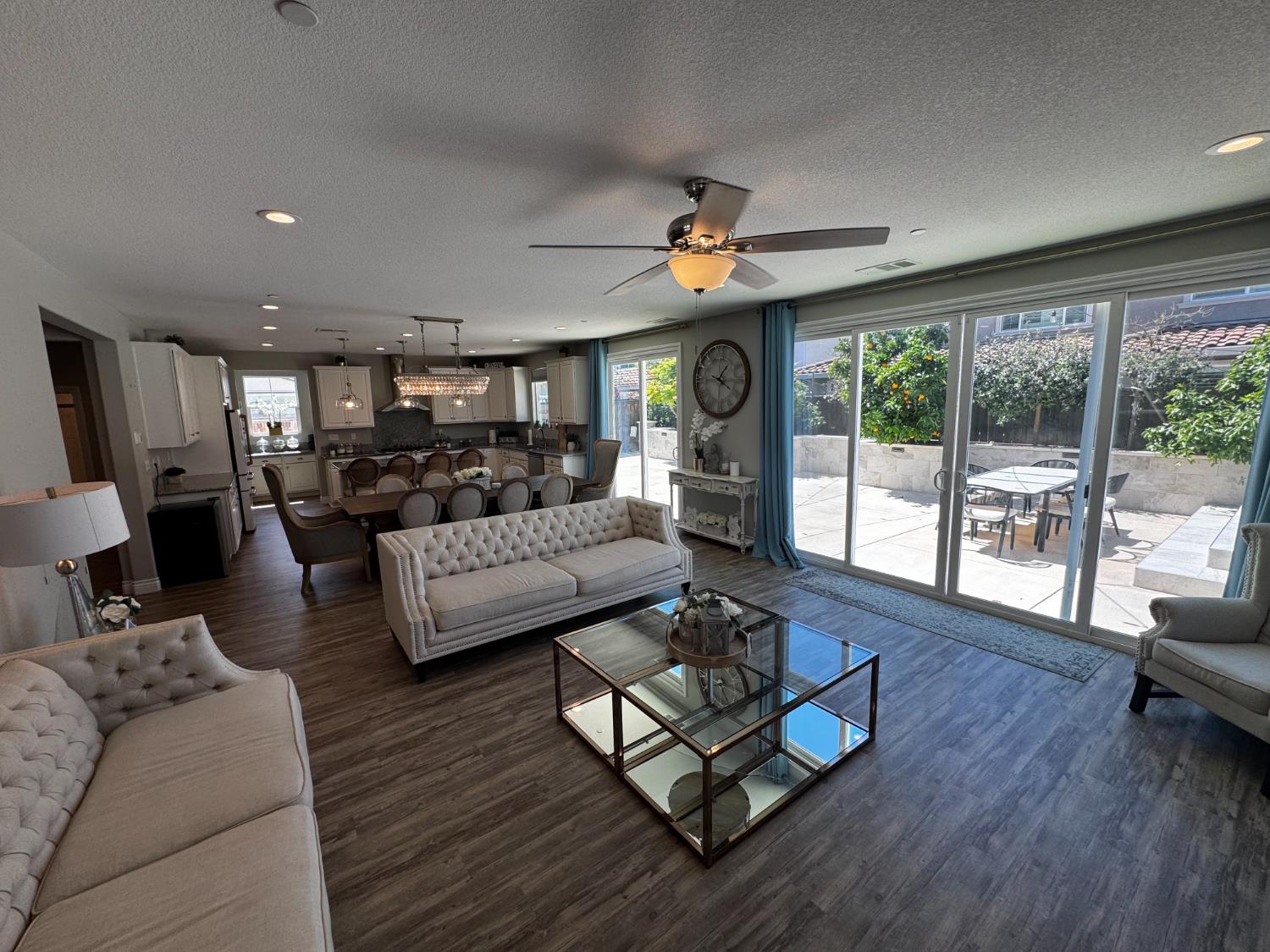 8026 Prairie Hawk Way Sacramento, CA 95829 - Photo 13 of 30 a living room with furniture and a large window