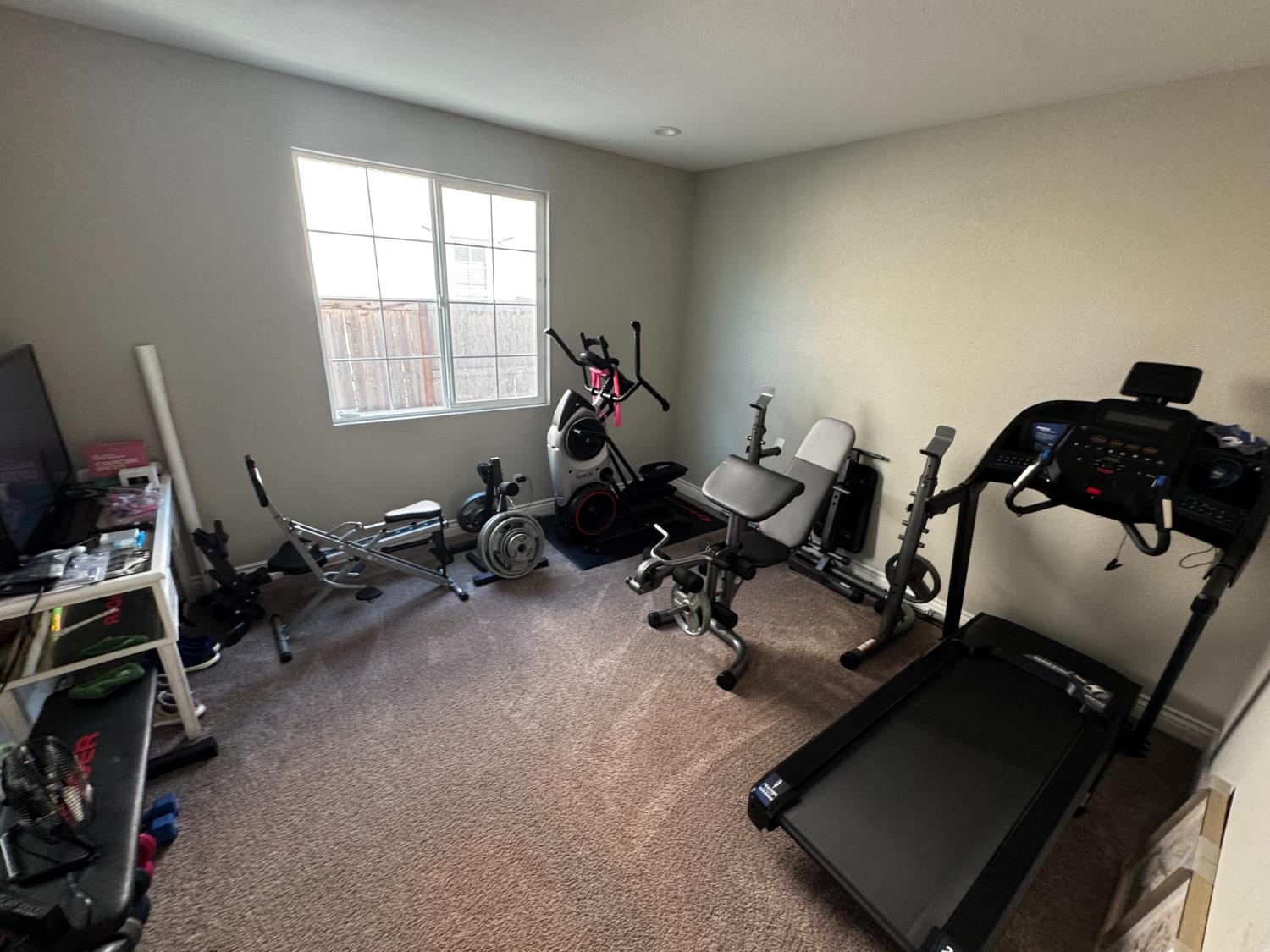 8026 Prairie Hawk Way Sacramento, CA 95829 - Photo 15 of 30 a view of a room with gym equipment