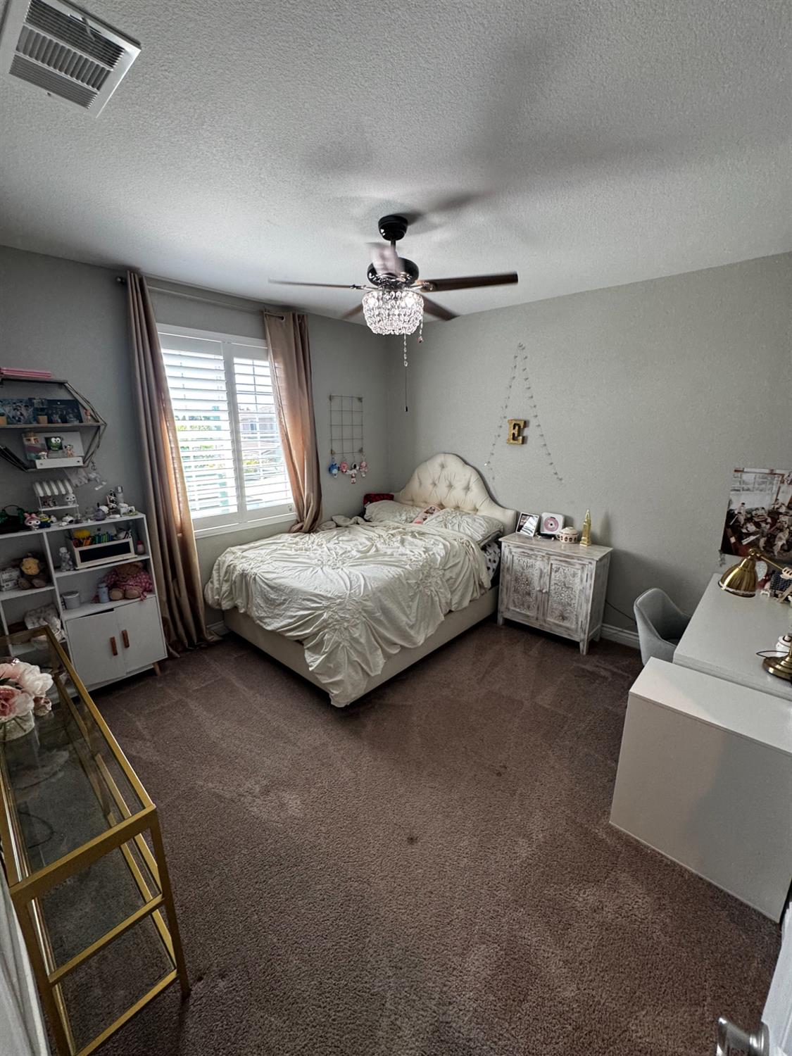 8026 Prairie Hawk Way Sacramento, CA 95829 - Photo 21 of 30 a bedroom with bed and window