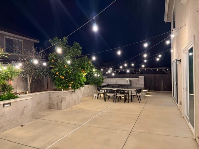 8026 Prairie Hawk Way Sacramento, CA 95829 - Photo 26 of 30 a view of a patio with table and chairs and potted plants