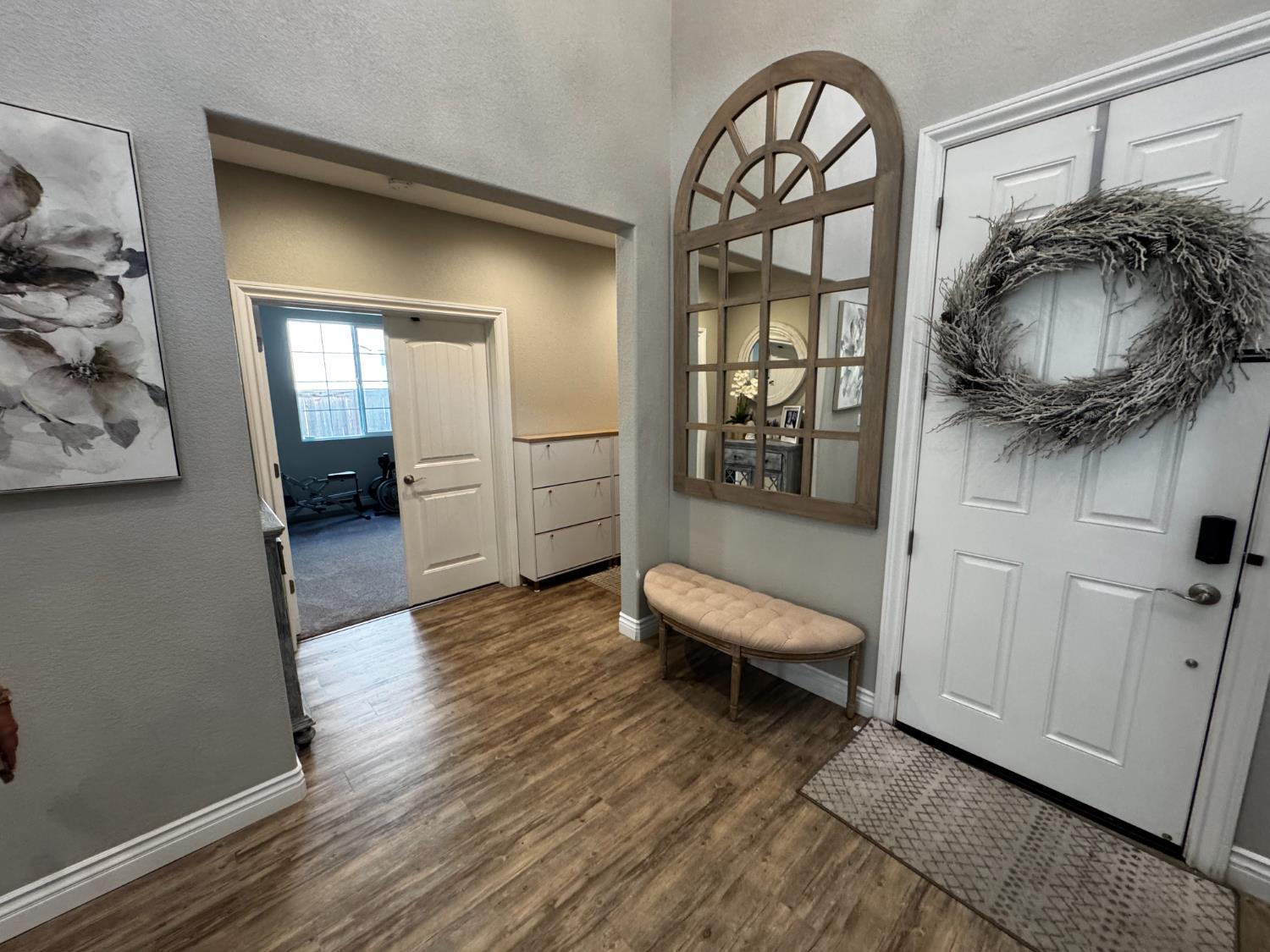 8026 Prairie Hawk Way Sacramento, CA 95829 - Photo 6 of 30 a living room with furniture and a wooden floor