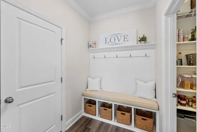 a kitchen with stainless steel appliances a refrigerator and a stove top oven