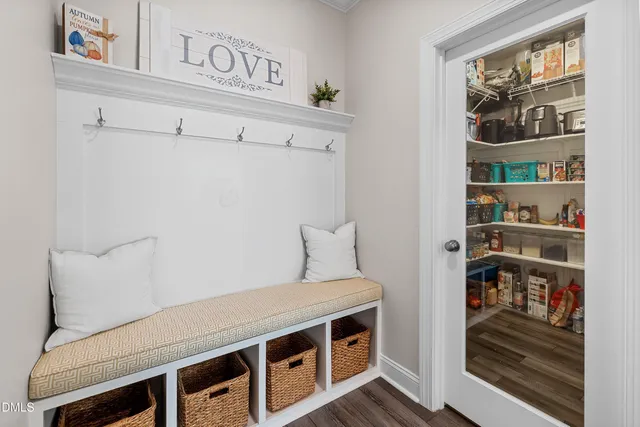 a view of an empty room with shelves