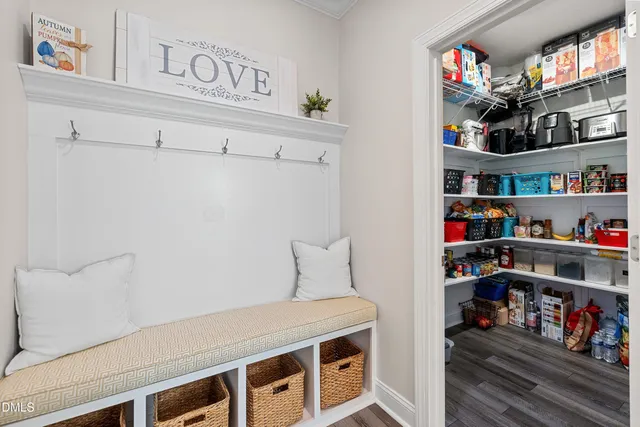 a view of an empty room with shelves