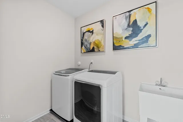 a bathroom with a bathtub and a window