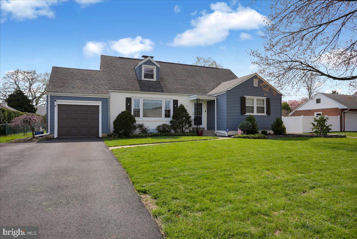 3812 Reiff Place Reading, PA 19606 - Photo 2 of 38 a front view of a house with garden