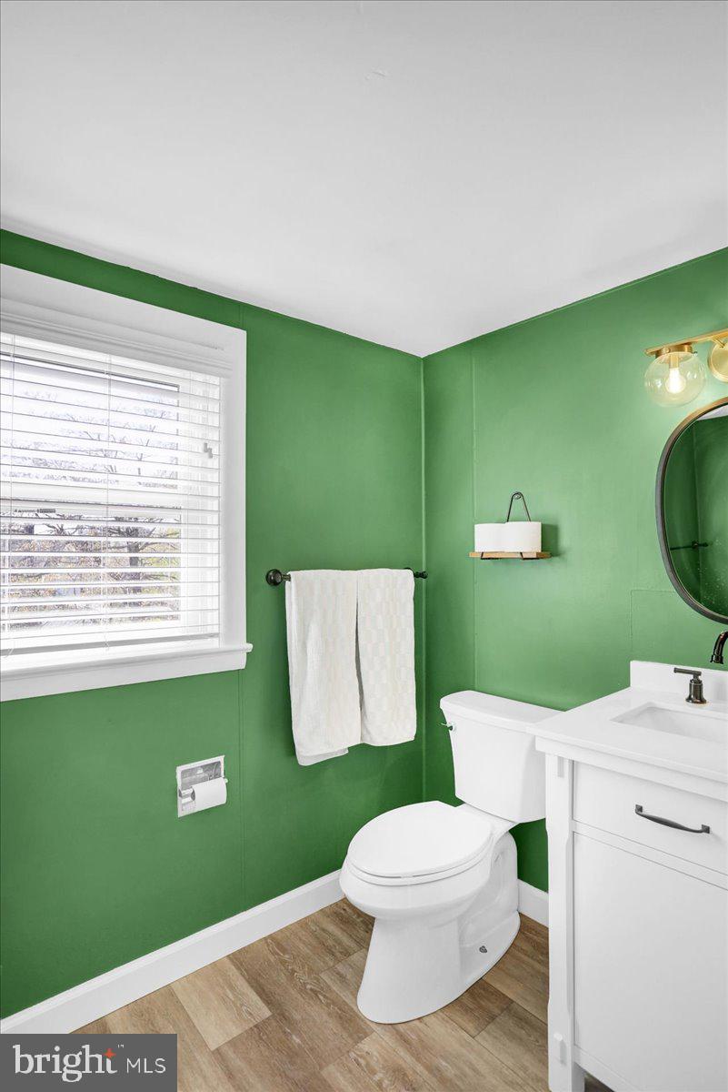 3812 Reiff Place Reading, PA 19606 - Photo 22 of 38 a bathroom with a toilet sink and mirror