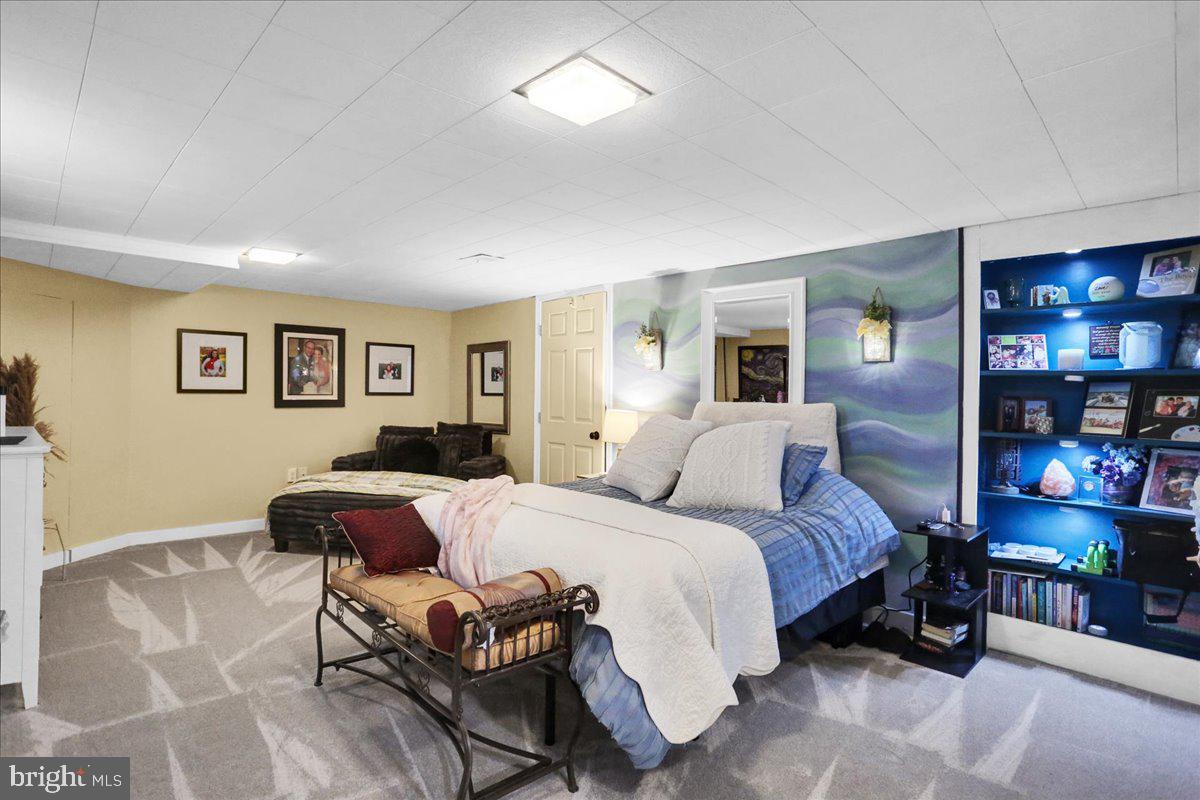 3812 Reiff Place Reading, PA 19606 - Photo 27 of 38 a bedroom with a bed and lamp