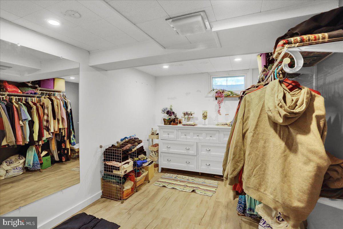 3812 Reiff Place Reading, PA 19606 - Photo 29 of 38 a view of walk in closet with clothes and shoes