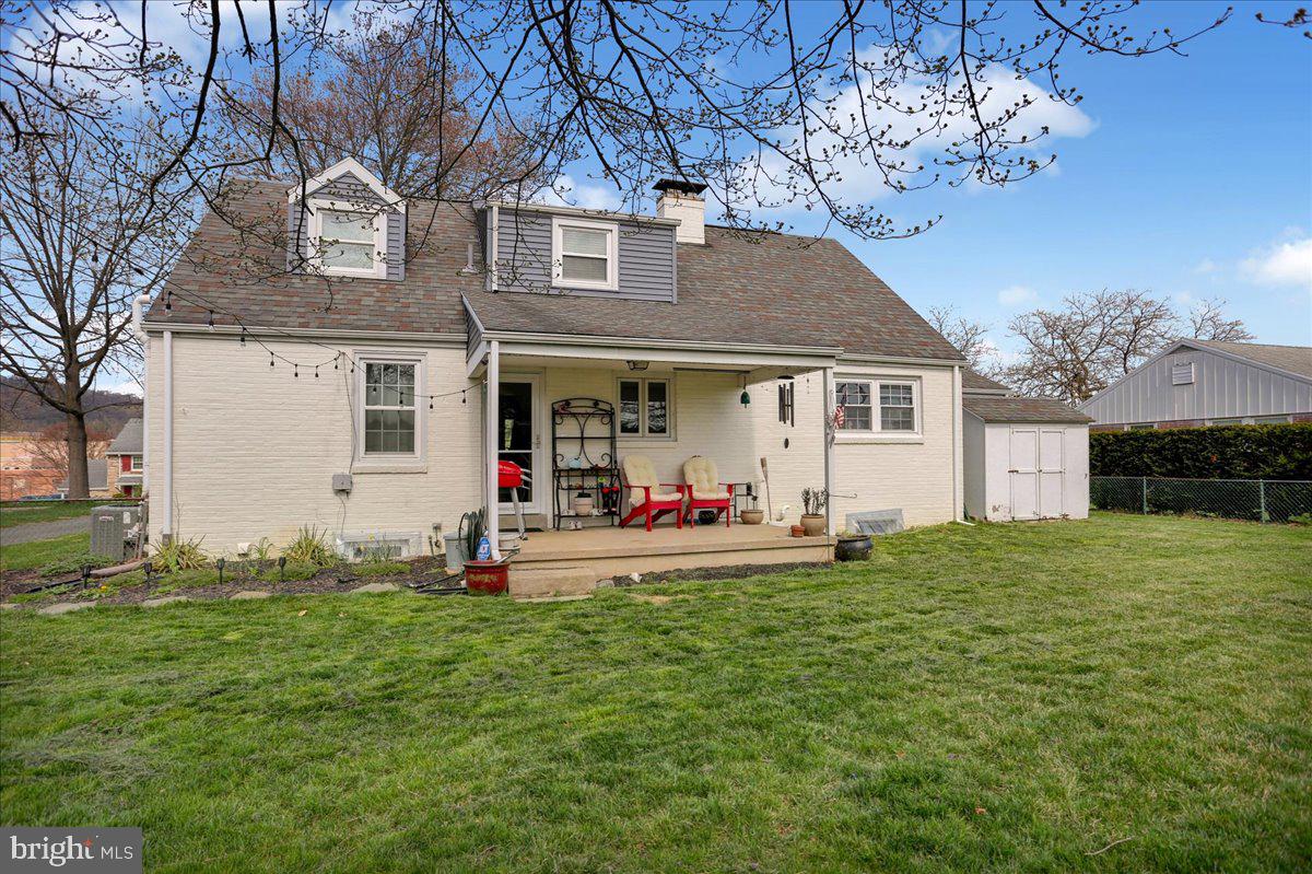 3812 Reiff Place Reading, PA 19606 - Photo 36 of 38 a front view of a house with a yard