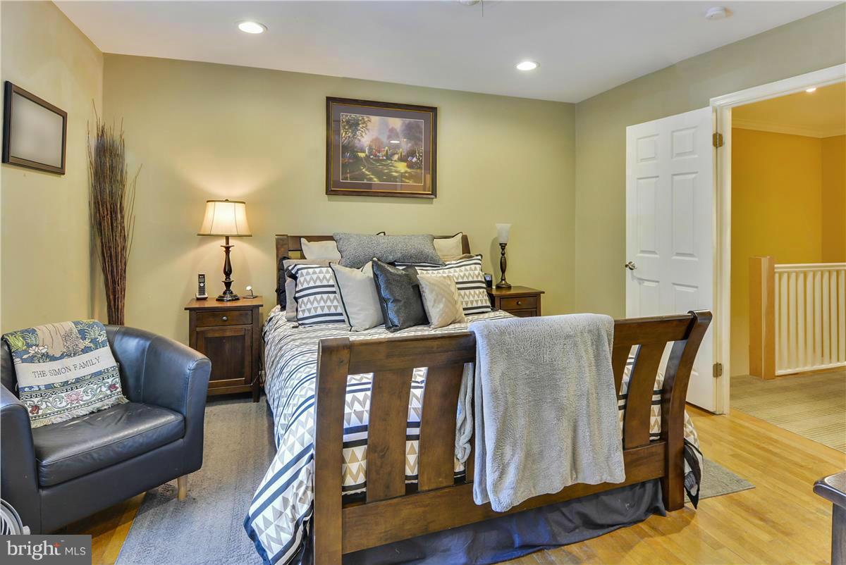 3873 Chain Bridge Road Fairfax, VA 22030 - Photo 15 of 29 a living room with furniture and wooden floor