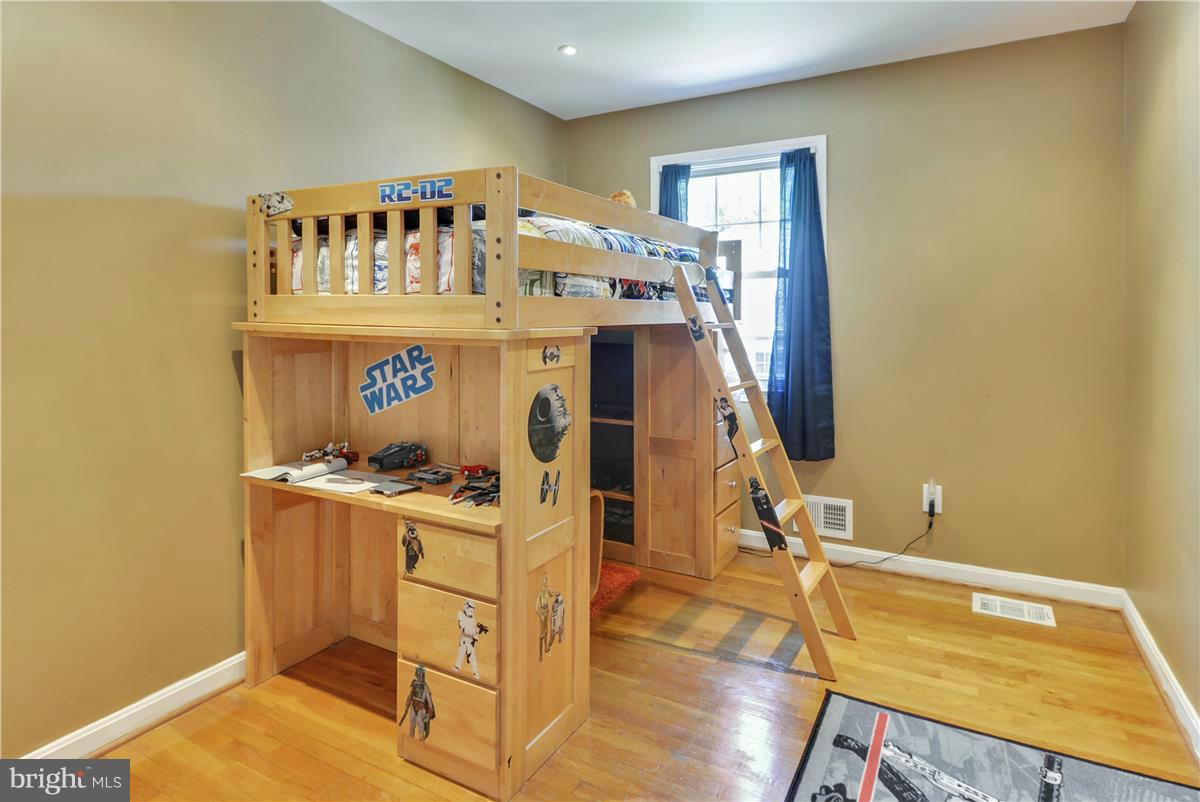 3873 Chain Bridge Road Fairfax, VA 22030 - Photo 20 of 29 a view of a kitchen with fridge and wooden floor