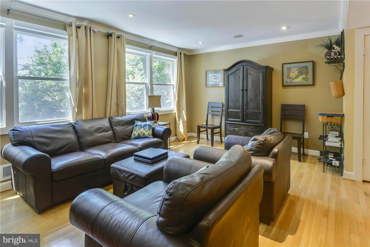 3873 Chain Bridge Road Fairfax, VA 22030 - Photo 6 of 29 a living room with furniture and a large window