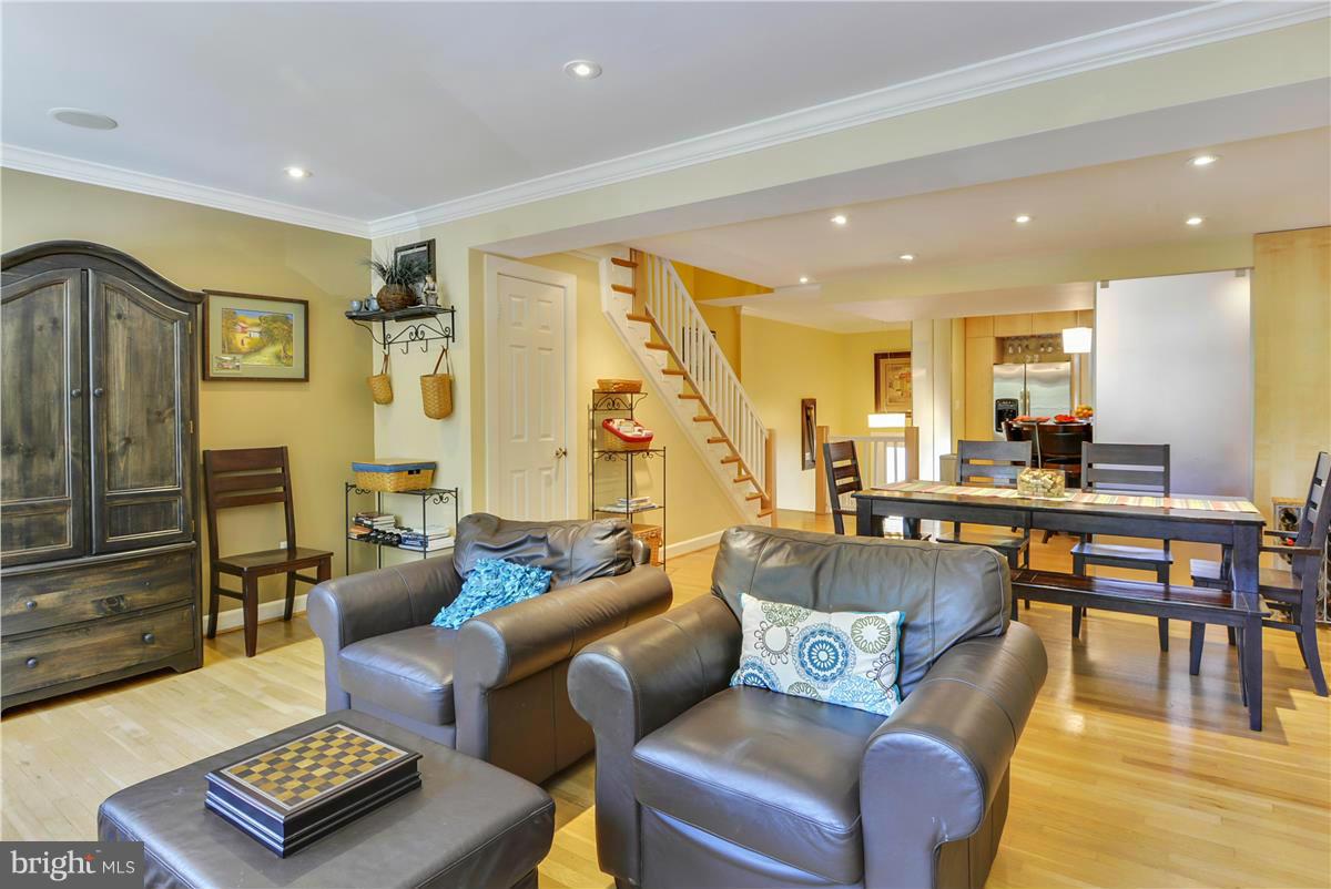 3873 Chain Bridge Road Fairfax, VA 22030 - Photo 7 of 29 a living room with furniture and a table