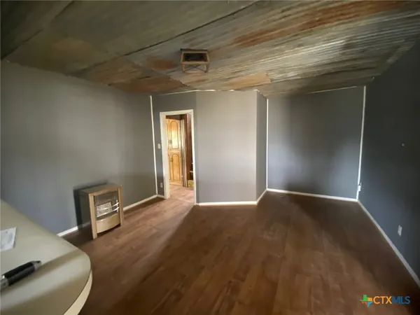 a view of an empty room and a gallery