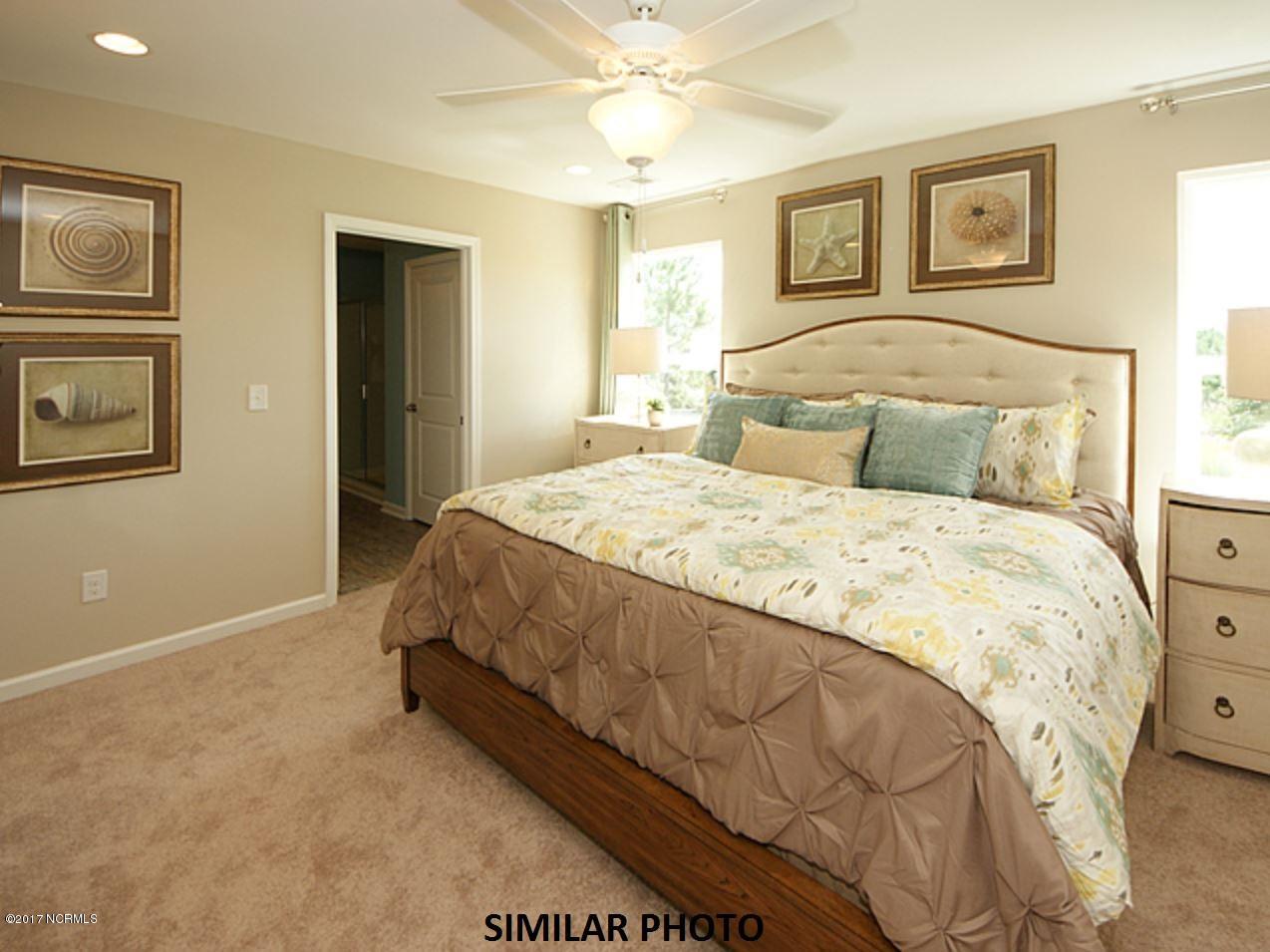 105 Tralee Place, Unit 45 Holly Ridge, NC 28445 - Photo 17 of 33 Owner's Bedroom