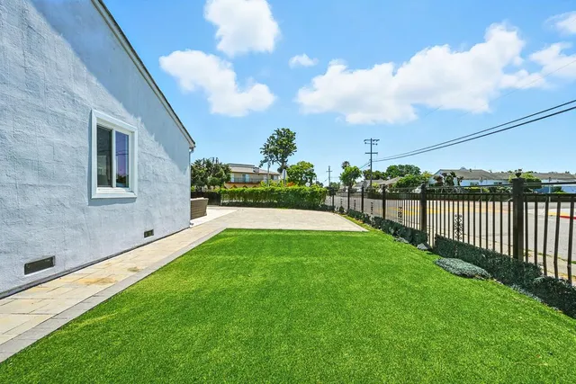 a view of a backyard with a garden