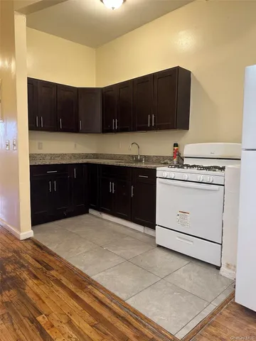 a kitchen with a cabinets and sink