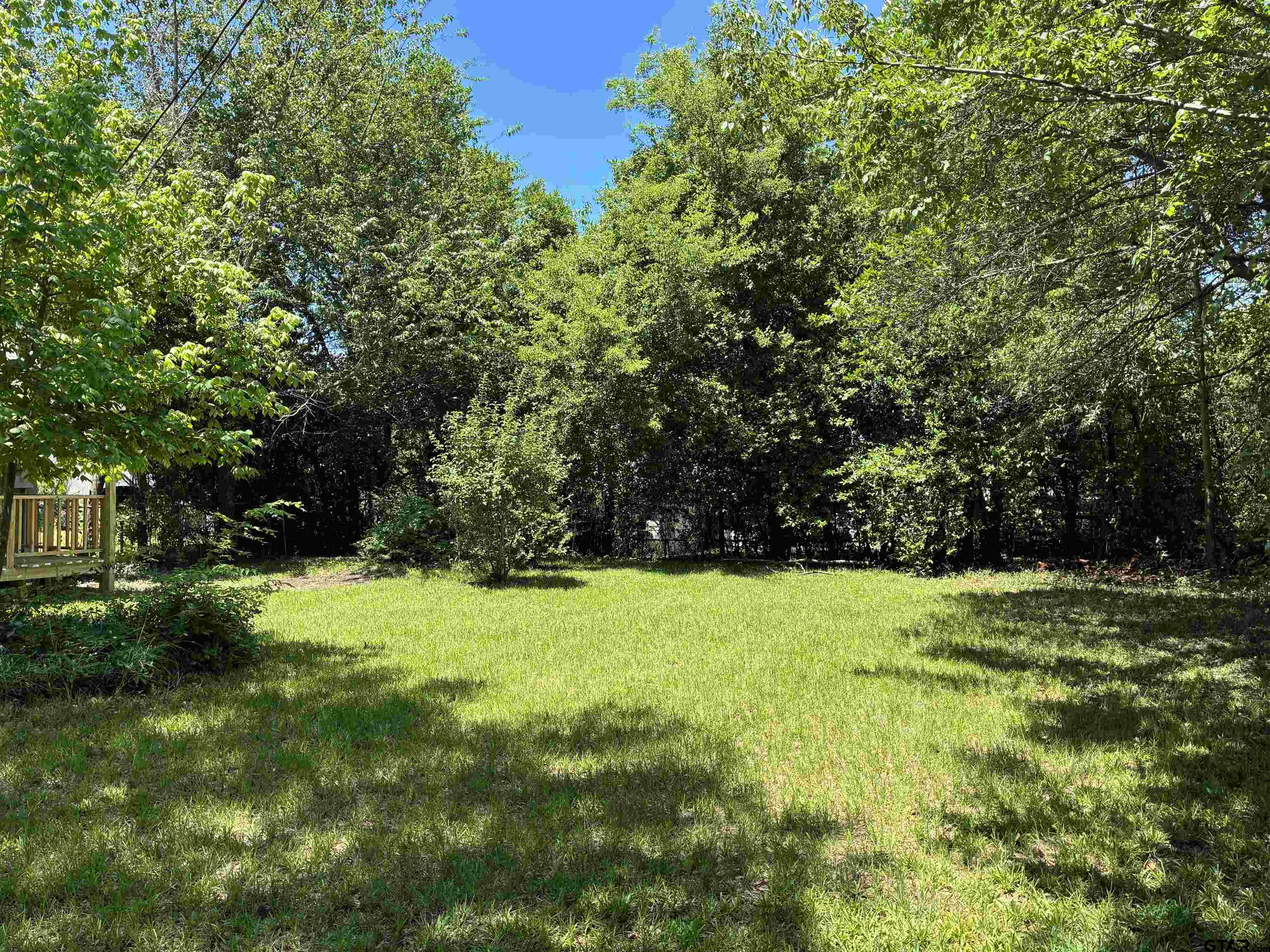 811 West 5th Street Tyler, TX 75701 - Photo 26 of 26 a view of outdoor space with deck and yard