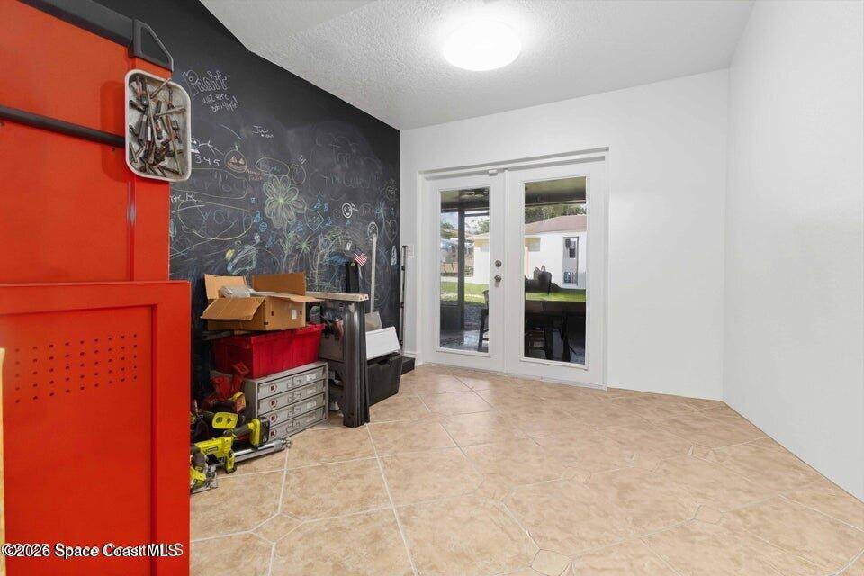 1280 Highway 1, Unit B Malabar, FL 32950 - Photo 15 of 26 a view of a room with furniture and a fireplace